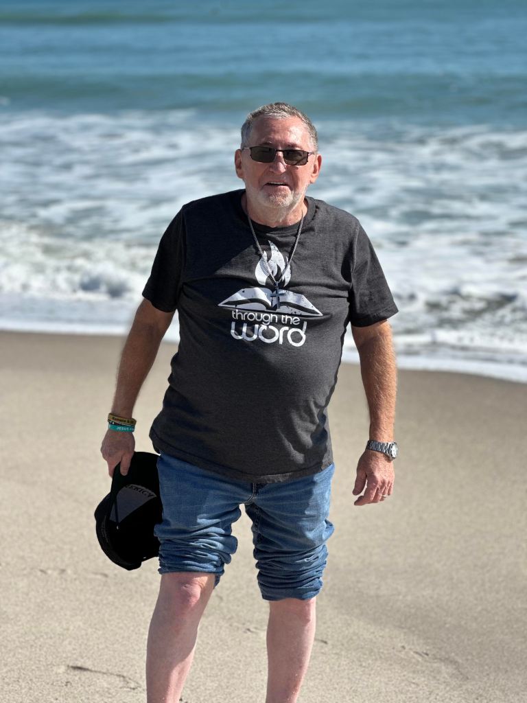 John walking on the beach